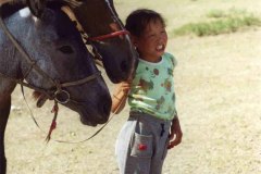 BIerma-holding-2-horses-WM